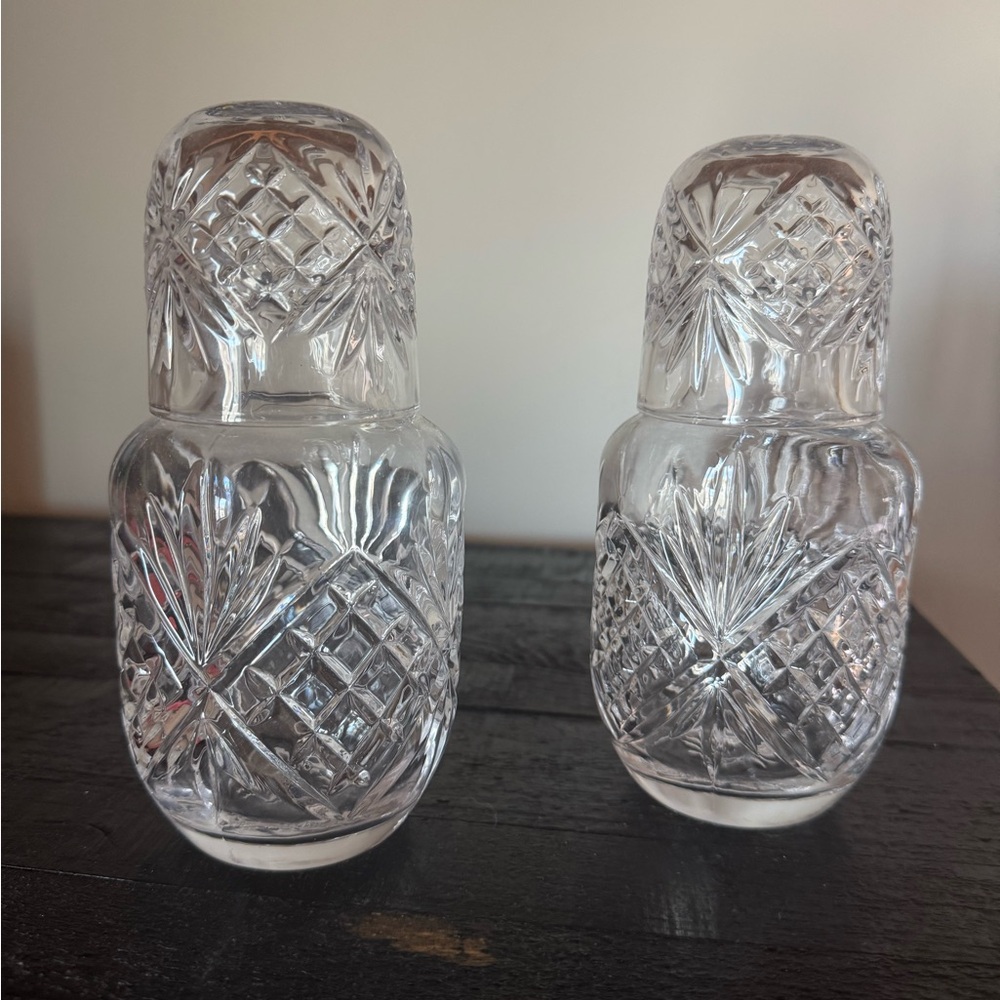 Elegant Crystal bedside water vases.  The tops are the cups.  Keep water clean
